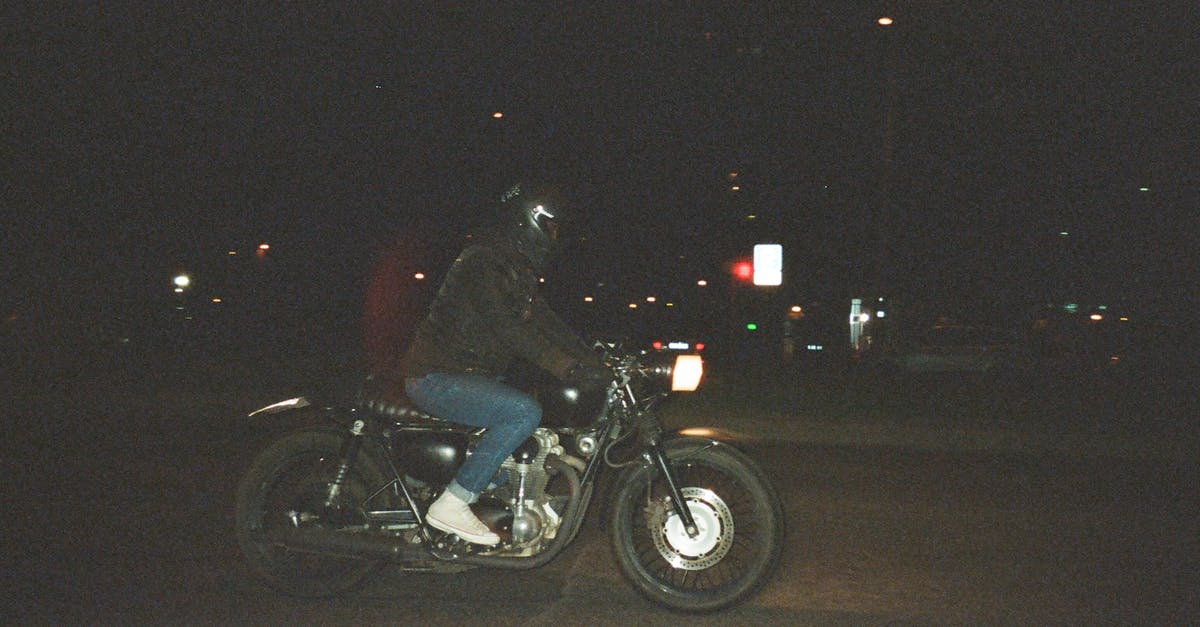 Time needed to get a Vietnamese motorcycle license and riding into Laos and Cambodia? [closed] - Person Riding on Motorcycle on Road during Nighttime