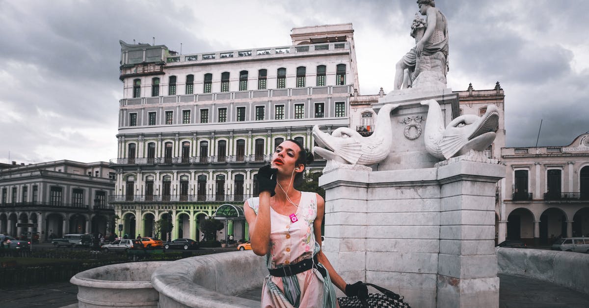 Tipping in Cuba as a Canadian - A Person Posing Beside a Statue Monument Tipping in Cuba as a Canadian - A Person Posing Beside a Statue Monument