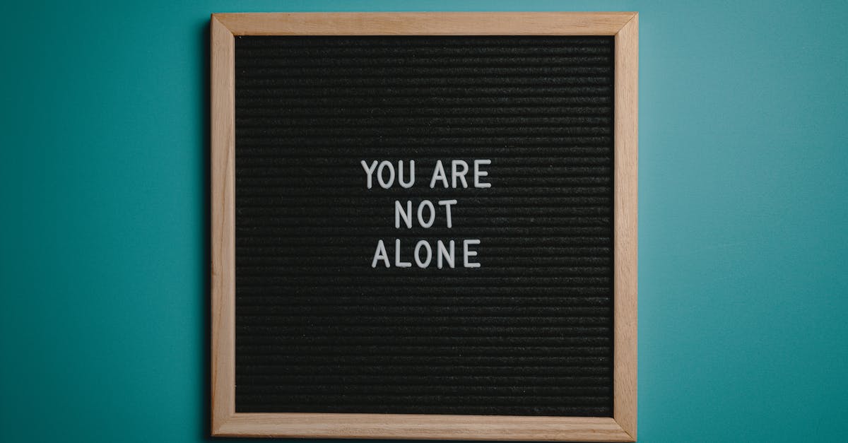 Tipping in Poland: saying "thank you" when the waiter collects your money - You Are Not Alone Quote Board on Brown Wooden Frame