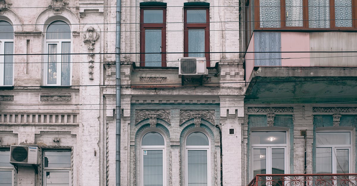 Tour or circuit to see different Melbourne neighborhoods? - Facade of old stone building in classic style Tour or circuit to see different Melbourne neighborhoods? - Facade of old stone building in classic style