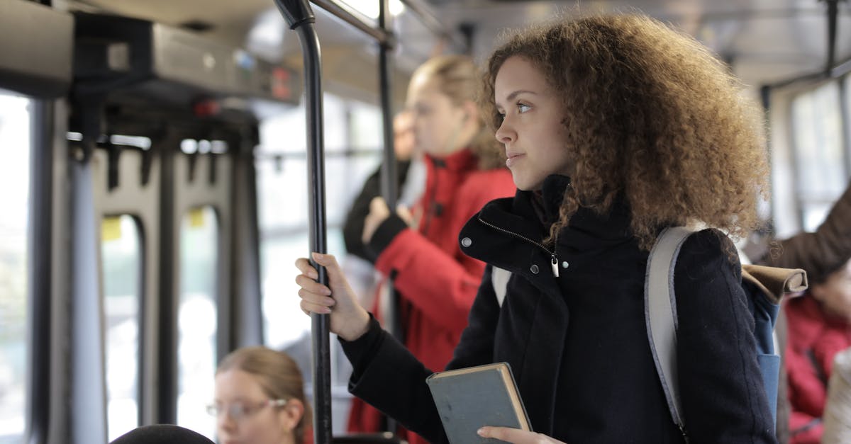 Tourism in the Schengen area either side of a student visa - Serious young lady riding bus with book and backpack Tourism in the Schengen area either side of a student visa - Serious young lady riding bus with book and backpack