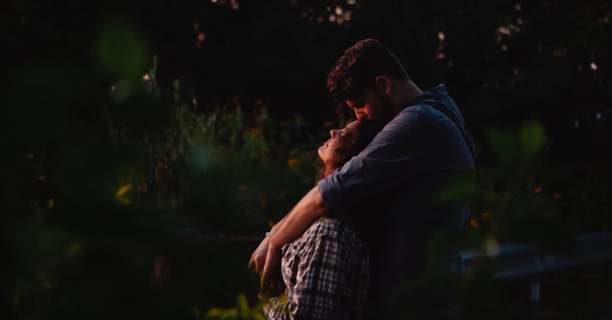 Tourist Schengen visa dates do not match itinerary - Loving young couple embracing in forest at sunset Tourist Schengen visa dates do not match itinerary - Loving young couple embracing in forest at sunset