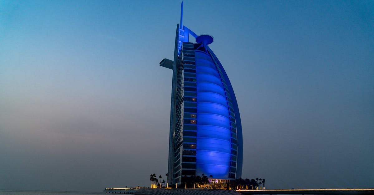 Tourist visa policies in Dubai - Blue High-rise Building Tourist visa policies in Dubai - Blue High-rise Building