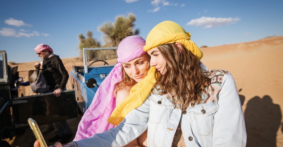 Tourist visa policies in Dubai - Two Women Wearing Head Scarf Taking Selfie Together Tourist visa policies in Dubai - Two Women Wearing Head Scarf Taking Selfie Together