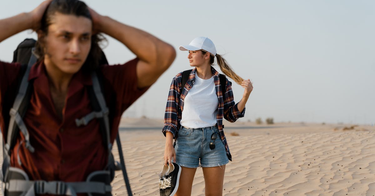 Tourist visa to Costa Rica as a Filipino? - Woman in Blue Denim Shorts and Plaid Shirt Standing on Brown Sand Tourist visa to Costa Rica as a Filipino? - Woman in Blue Denim Shorts and Plaid Shirt Standing on Brown Sand