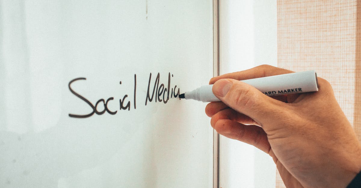 Training for 3 month and attending conference is elegible under VWP? - Crop anonymous male teacher writing on whiteboard with marker during social media training courses