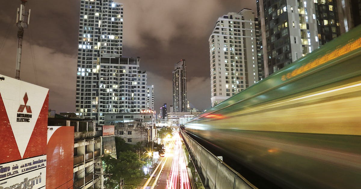 Trains in and out of Bangkok around Songkran - White and Yellow Vehicle Light on Road Time Laps Photography during Nighttime Trains in and out of Bangkok around Songkran - White and Yellow Vehicle Light on Road Time Laps Photography during Nighttime