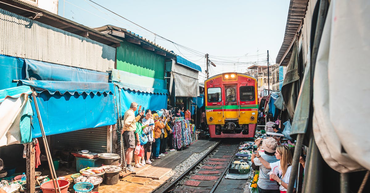 Trains in and out of Bangkok around Songkran - People Walking on the Street Trains in and out of Bangkok around Songkran - People Walking on the Street
