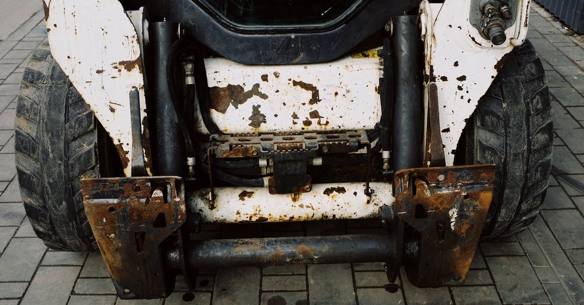 Tram service to Old Trafford from Manchester Picadilly? - From above place of arm installation on shabby heavy duty mini loader with white frame Tram service to Old Trafford from Manchester Picadilly? - From above place of arm installation on shabby heavy duty mini loader with white frame