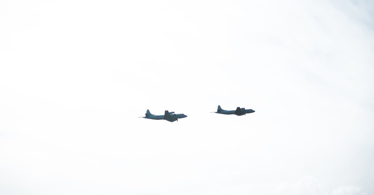 Transfer between Trysil and Scandinavian Mountains Airport - Grayscale Photography of Gray Airplanes Transfer between Trysil and Scandinavian Mountains Airport - Grayscale Photography of Gray Airplanes