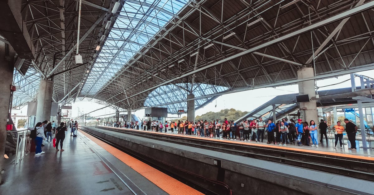 Transit counted as Schengen days? - Crowd of people standing on platform of railway station and waiting train in busy day Transit counted as Schengen days? - Crowd of people standing on platform of railway station and waiting train in busy day