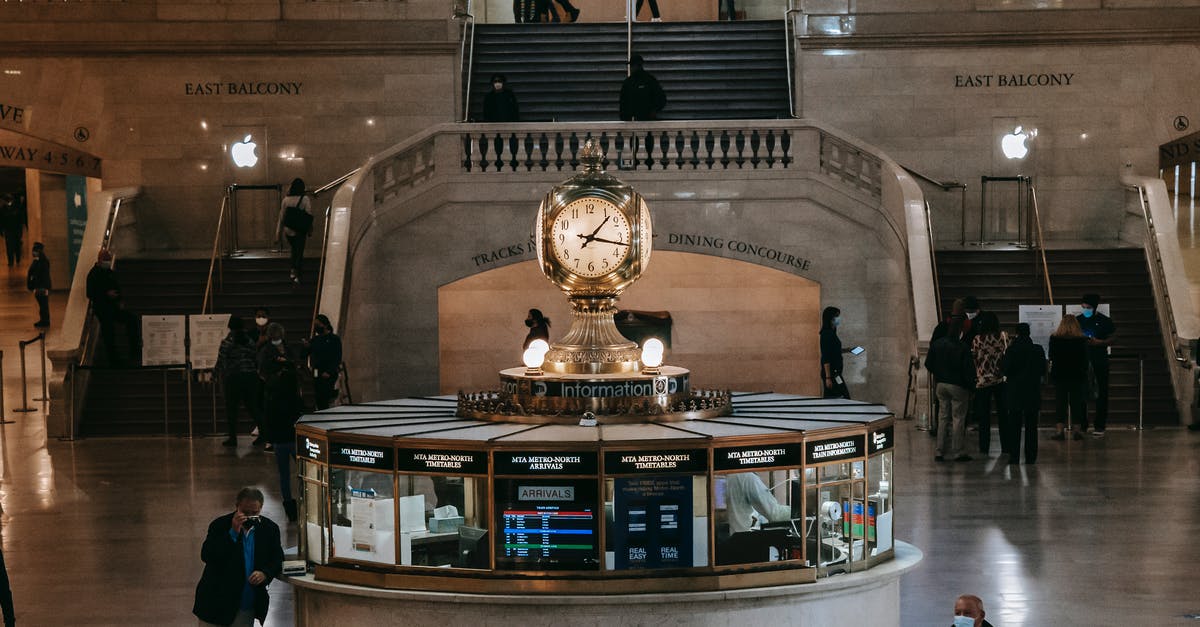 Transit points to the Bahamas other than in the USA - Public railway station with clock in center