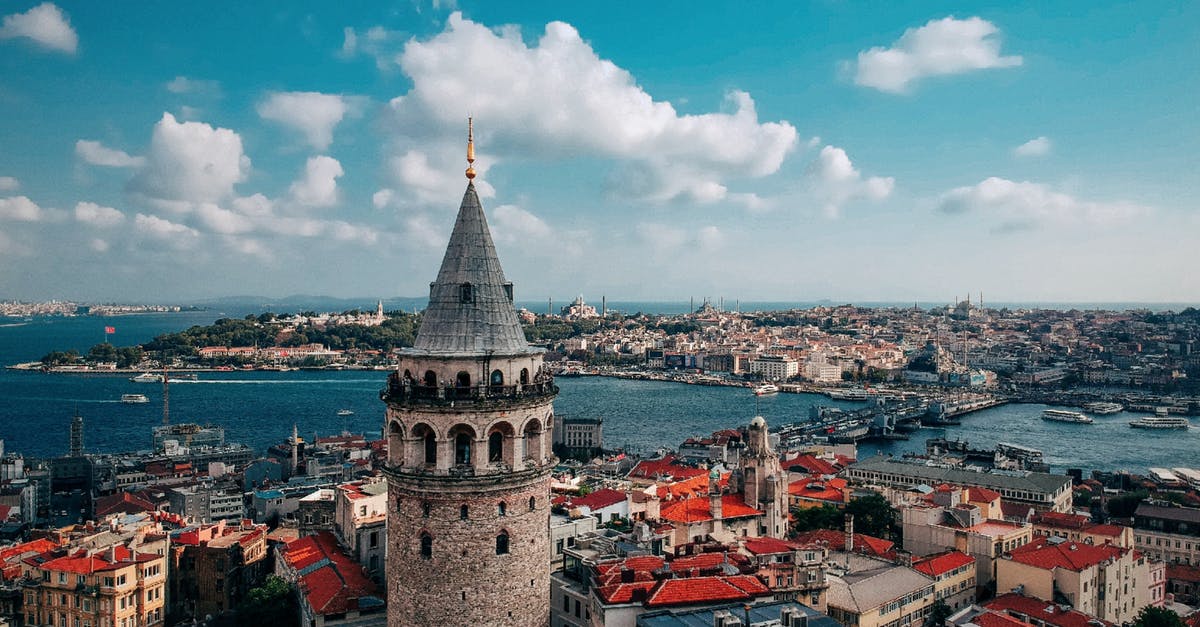 Transit Visa / Stopover in Istanbul - Brown Concrete Building Near Body of Water Transit Visa / Stopover in Istanbul - Brown Concrete Building Near Body of Water