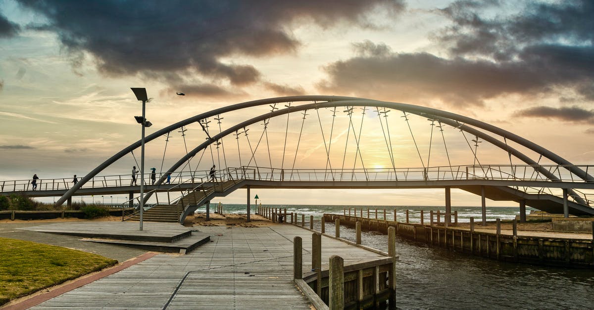 Transit visa for Australia - Gray Metal Bridge over Body of Water Under Gray Clouds Transit visa for Australia - Gray Metal Bridge over Body of Water Under Gray Clouds