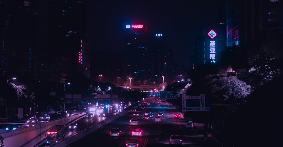 Transit Visa for China for layover in Guangzhou and Wuhan - Vehicles On Road At Night Transit Visa for China for layover in Guangzhou and Wuhan - Vehicles On Road At Night