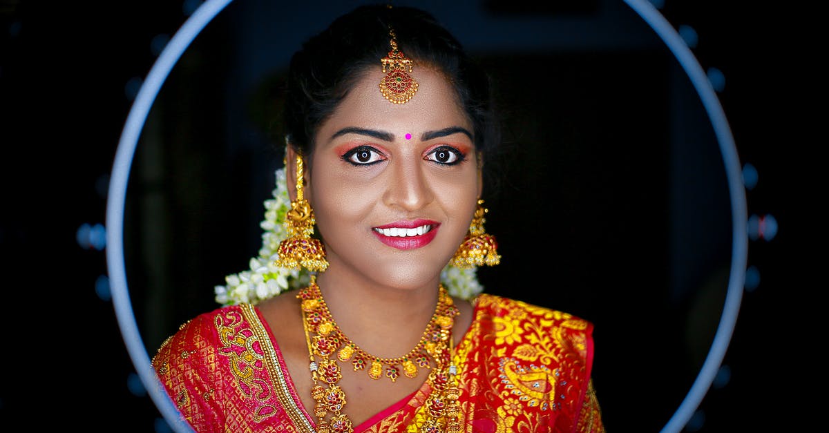 Transit visa in India for Bangladeshi - Woman in Red and Gold Floral Sari Transit visa in India for Bangladeshi - Woman in Red and Gold Floral Sari