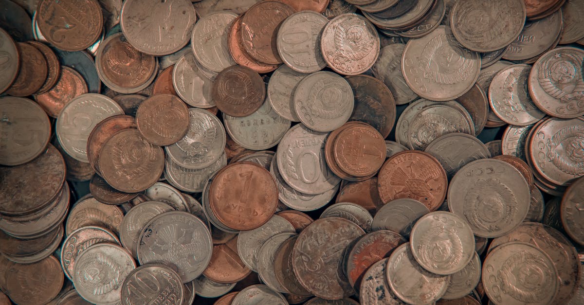 Transiting through Switzerland by coach with lots of cash - Brown and Silver Round Coins Transiting through Switzerland by coach with lots of cash - Brown and Silver Round Coins