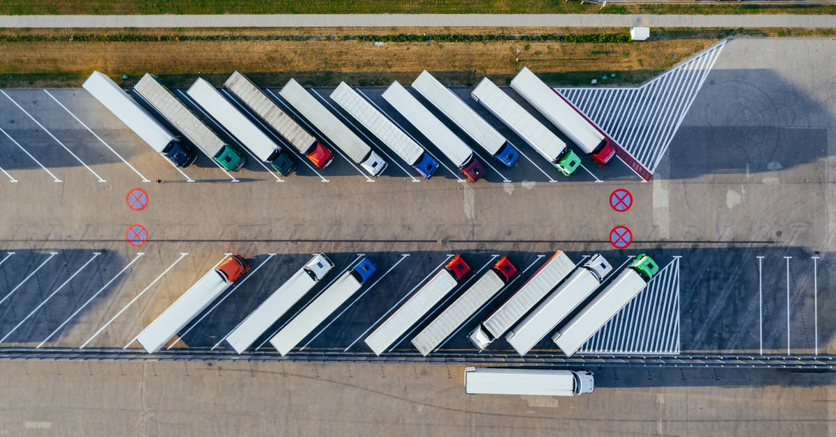 Transportation from St Pancras to Isle of Wight - Aerial Photography Of Trucks Parked Transportation from St Pancras to Isle of Wight - Aerial Photography Of Trucks Parked
