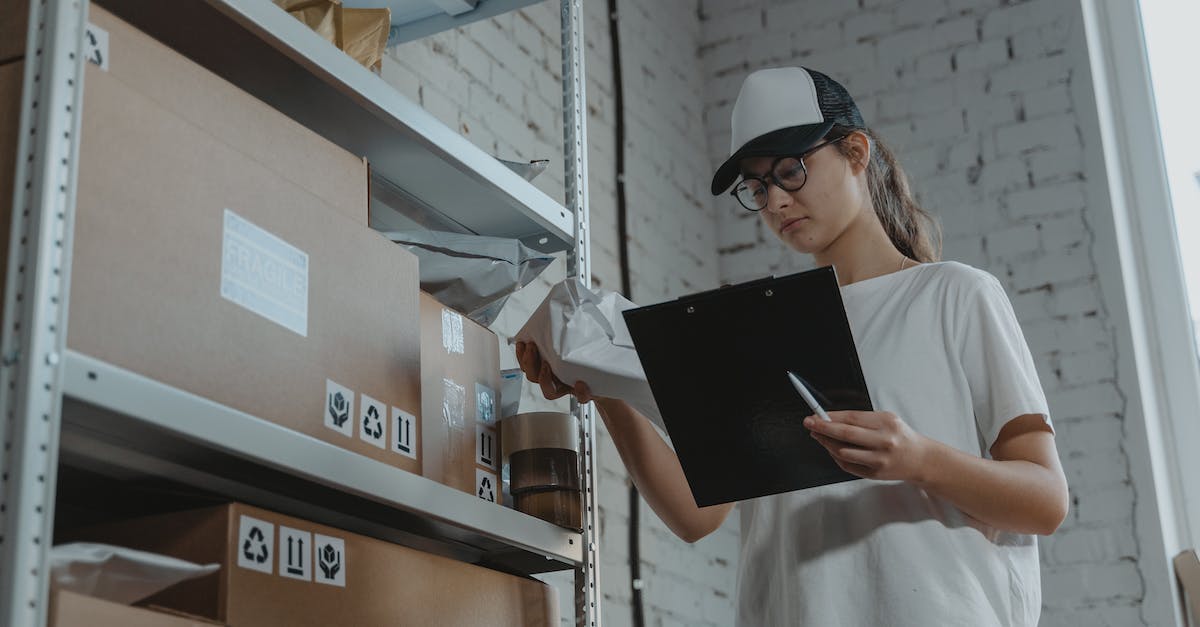 Transporting a big shipment of computer equipment to the Caribbean [closed] - Woman in White T-shirt Holding Black Laptop Computer