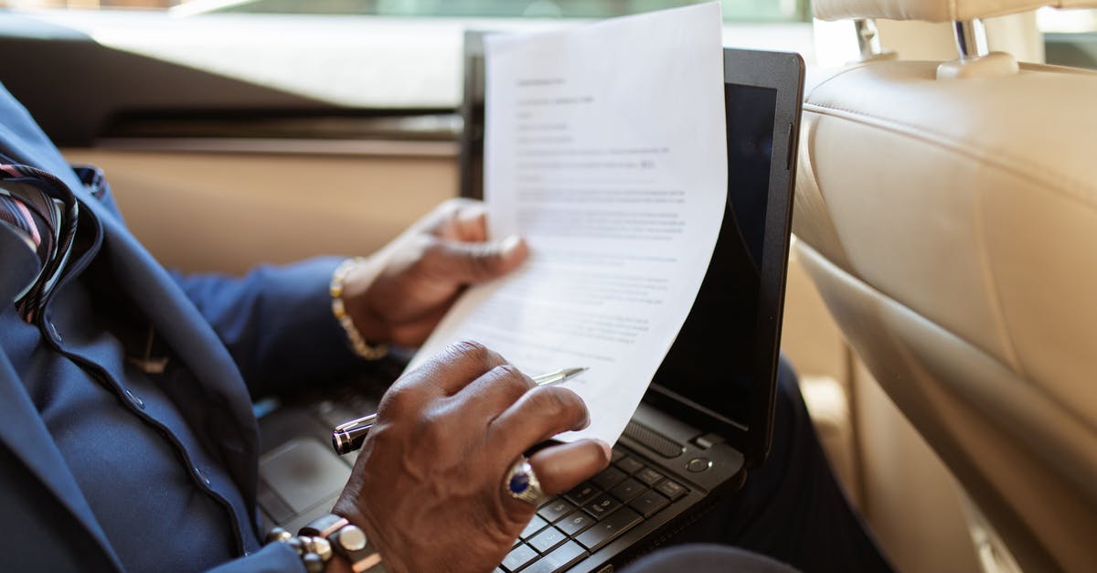 Travel documents and airlines rules - Person in Blue Long Sleeve Shirt Using Black Laptop Computer Travel documents and airlines rules - Person in Blue Long Sleeve Shirt Using Black Laptop Computer