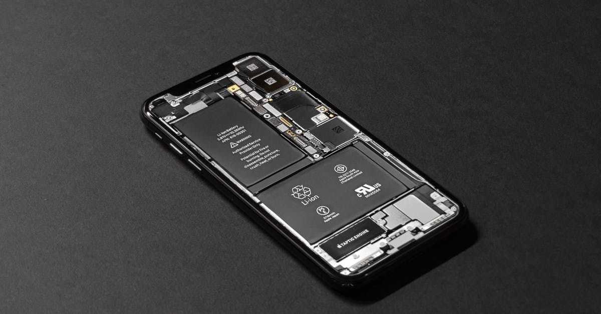 Travel Portable Battery - Black Android Smartphone on Table Travel Portable Battery - Black Android Smartphone on Table