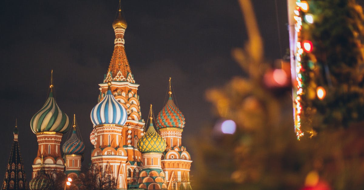 Travel restrictions with a Russian Visa? - Famous Cathedral of Vasily Blessed on Red Square against dark cloudy evening sky during Christmas holidays in Russian Federation Travel restrictions with a Russian Visa? - Famous Cathedral of Vasily Blessed on Red Square against dark cloudy evening sky during Christmas holidays in Russian Federation