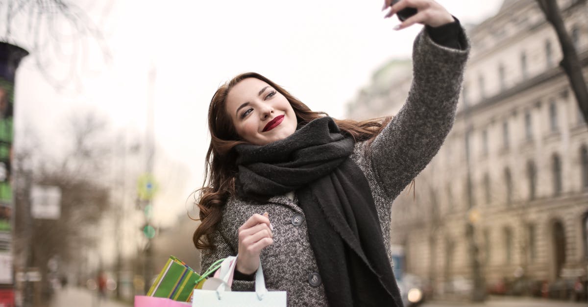Travel, shopping electronics (for private use) - Woman Taking a Selfie Using Smartphone Travel, shopping electronics (for private use) - Woman Taking a Selfie Using Smartphone