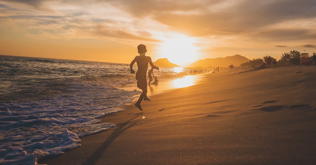 Travel to Ercan enroute Larnaca - Boys Playing on Seashore Travel to Ercan enroute Larnaca - Boys Playing on Seashore