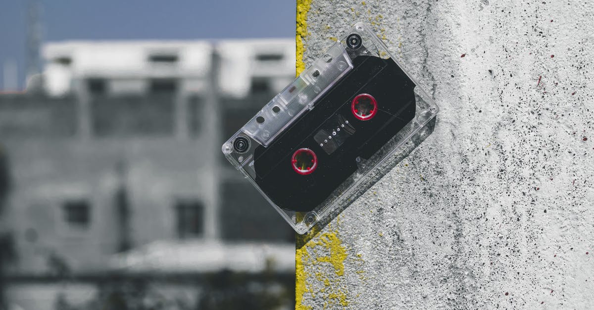 Travel to India's specific region where classical music and dance events happens [closed] - Clear and Black Cassette Tape on Gray Surface