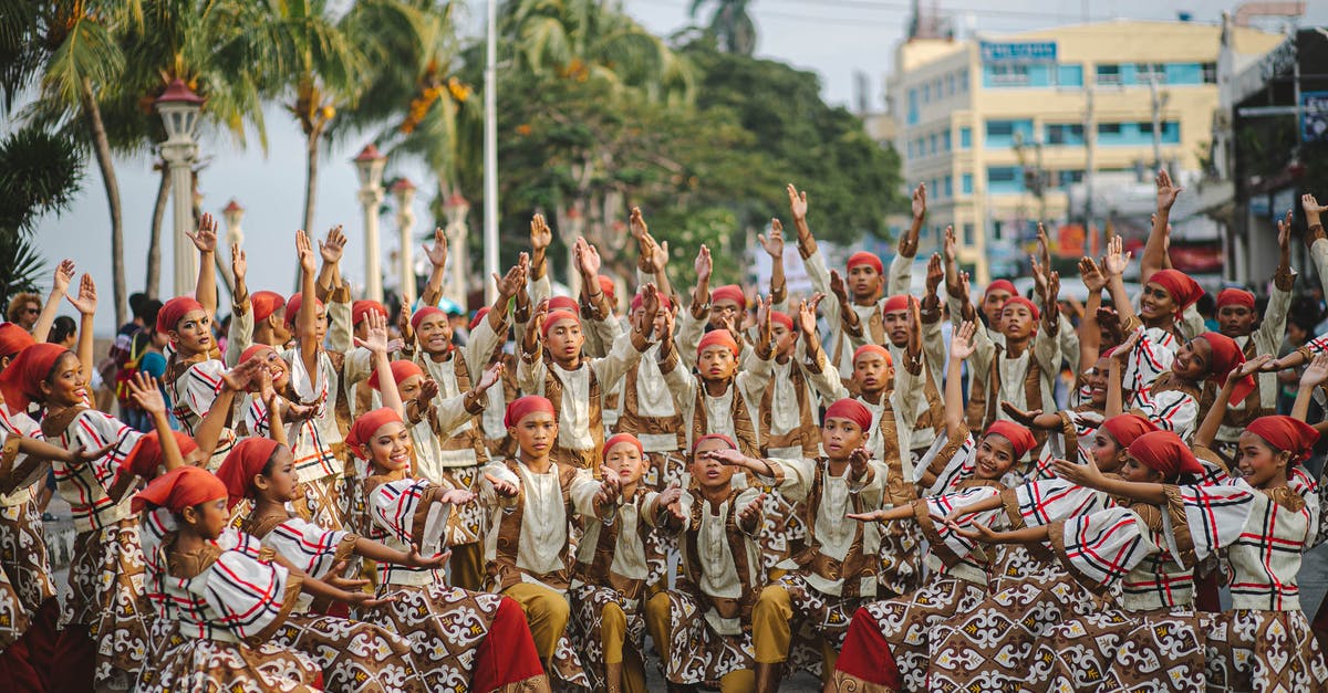 Travel to India's specific region where classical music and dance events happens [closed] - White-and-brown Costumes