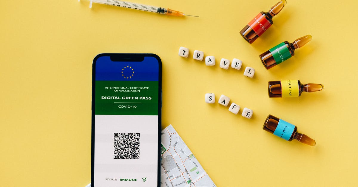 Travel to Switzerland during pandemic - Vaccine Ampules and a Smartphone Travel to Switzerland during pandemic - Vaccine Ampules and a Smartphone