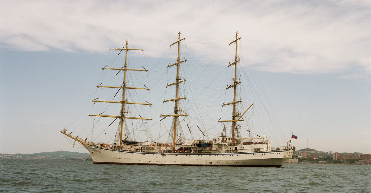 Travel to USA in cruise ship - White Clipper Ship on Ocean Under Cloudy Sky Travel to USA in cruise ship - White Clipper Ship on Ocean Under Cloudy Sky