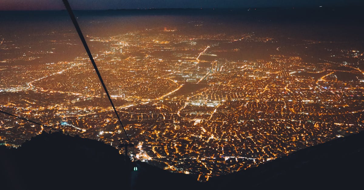 Traveling by plane to Schengen Area. What are the possible reasons that prevent me from entering the country? - View through window of cockpit of modern illuminated buildings located in megapolis at night Traveling by plane to Schengen Area. What are the possible reasons that prevent me from entering the country? - View through window of cockpit of modern illuminated buildings located in megapolis at night