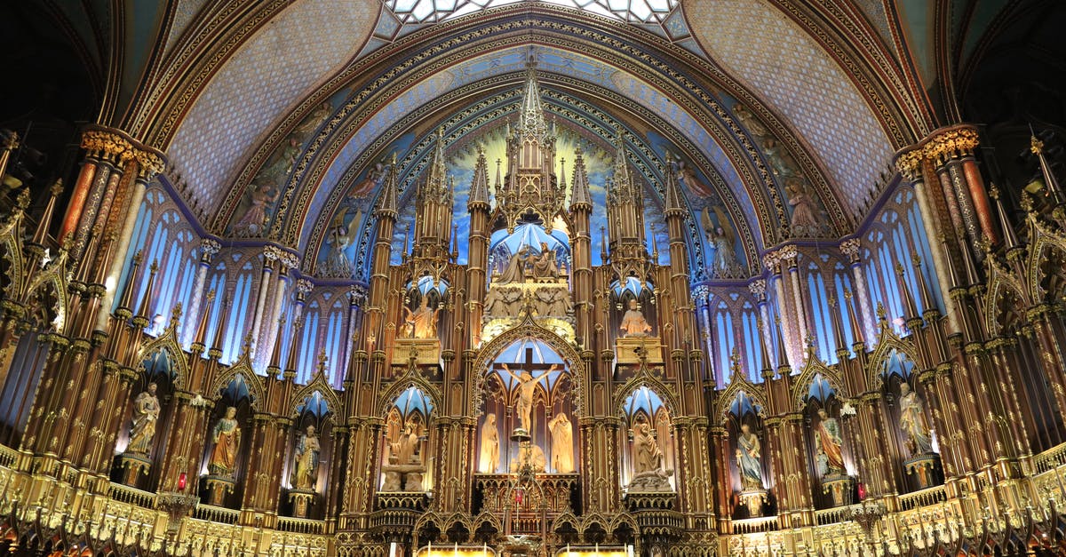 Traveling from Bangkok thu Oman then Germany final destination Canada - From below of ornamental altar with ancient sculptures and arched ceiling inside of famous Cathedral Basilica of Notre Dame de Quebec Traveling from Bangkok thu Oman then Germany final destination Canada - From below of ornamental altar with ancient sculptures and arched ceiling inside of famous Cathedral Basilica of Notre Dame de Quebec