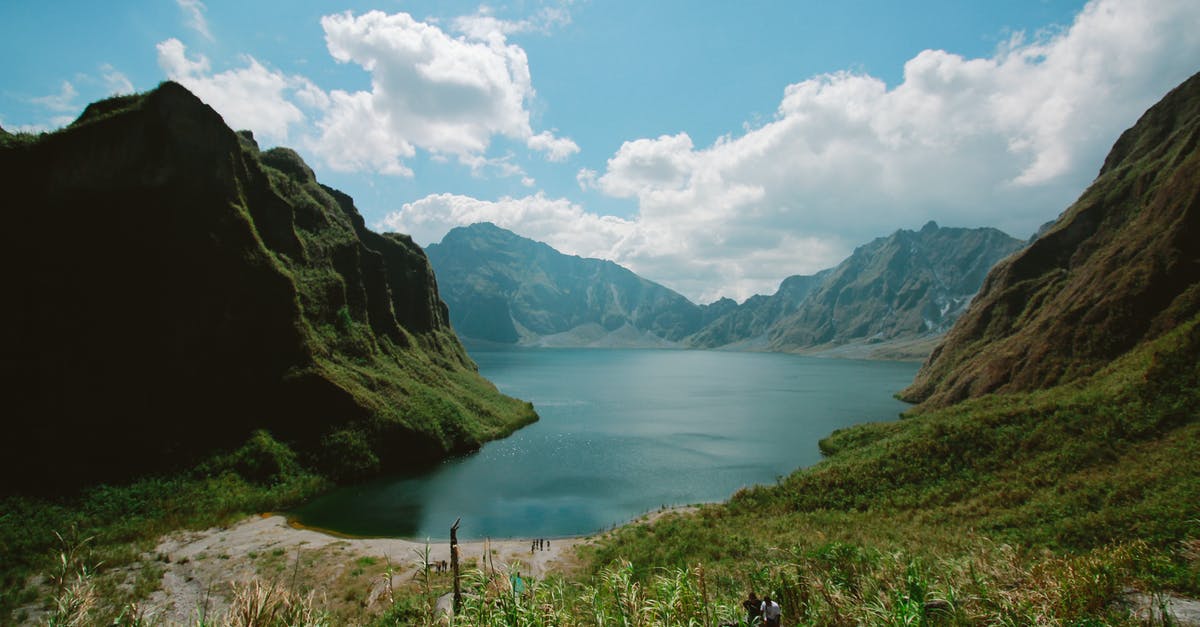 Traveling in the Philippines after Haiyan (Feb 2014) - Photography of Mountains Near Body of Water Traveling in the Philippines after Haiyan (Feb 2014) - Photography of Mountains Near Body of Water