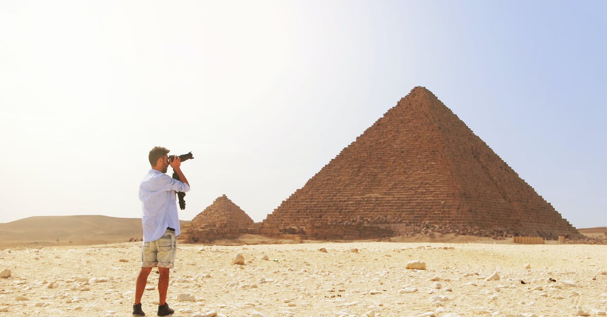 Traveling to Egypt if one is HIV positive? - Man Taking Photo of the Great Pyramid Traveling to Egypt if one is HIV positive? - Man Taking Photo of the Great Pyramid