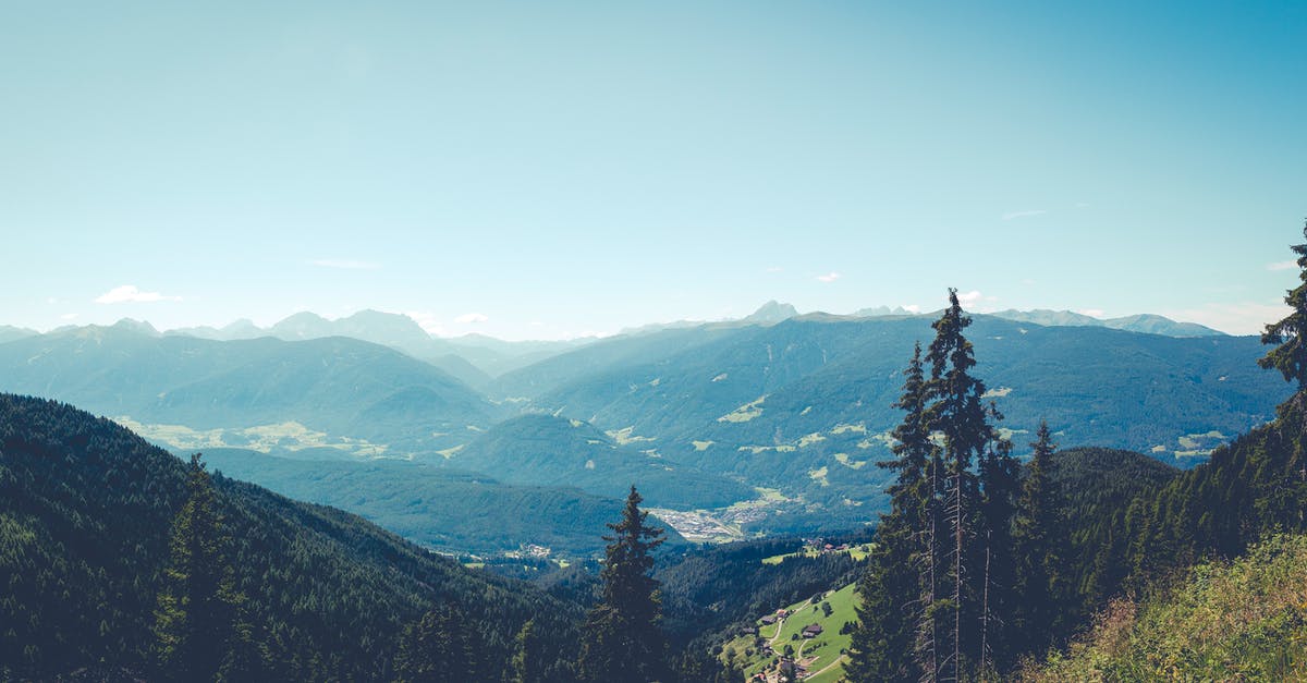 Traveling to Italy, then France, then Spain. In what country should I apply for my Schengen visa? [closed] - Green Pine Trees on Mountain Under Blue Sky