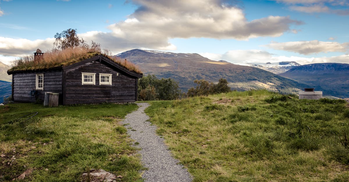 travelling before Visa Extension to home country - Brown and Beige House and Path travelling before Visa Extension to home country - Brown and Beige House and Path