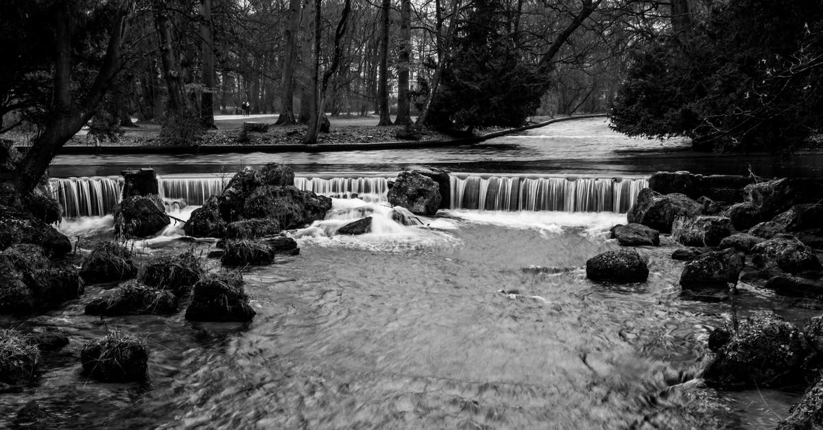 Travelling outside of Germany on a German Working Holiday visa (Australian) - Grayscale Photo of River Between Trees Travelling outside of Germany on a German Working Holiday visa (Australian) - Grayscale Photo of River Between Trees