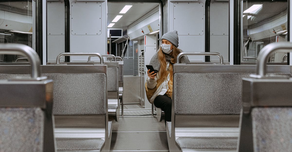 Travelling through France: subject to French restrictions re COVID-19? - Woman Wearing Mask on Train Travelling through France: subject to French restrictions re COVID-19? - Woman Wearing Mask on Train