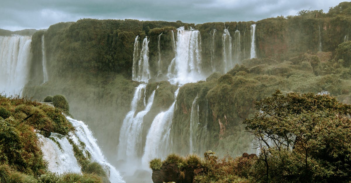 Travelling to Brazil without return ticket - Waterfalls Under Cloudy Sky Travelling to Brazil without return ticket - Waterfalls Under Cloudy Sky