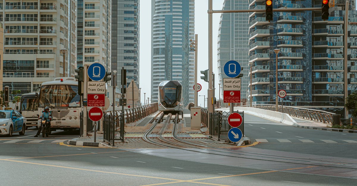 Travelling to Oman by Bus from Dubai - City Roads Near High Rise Buildings Travelling to Oman by Bus from Dubai - City Roads Near High Rise Buildings