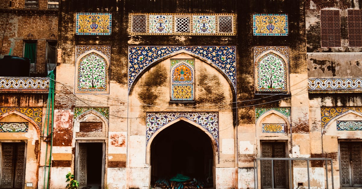 Travelling to Pakistan with expired NICOP - Facade Of An Old Building Designed With Colorful Mosaic Tiles Travelling to Pakistan with expired NICOP - Facade Of An Old Building Designed With Colorful Mosaic Tiles