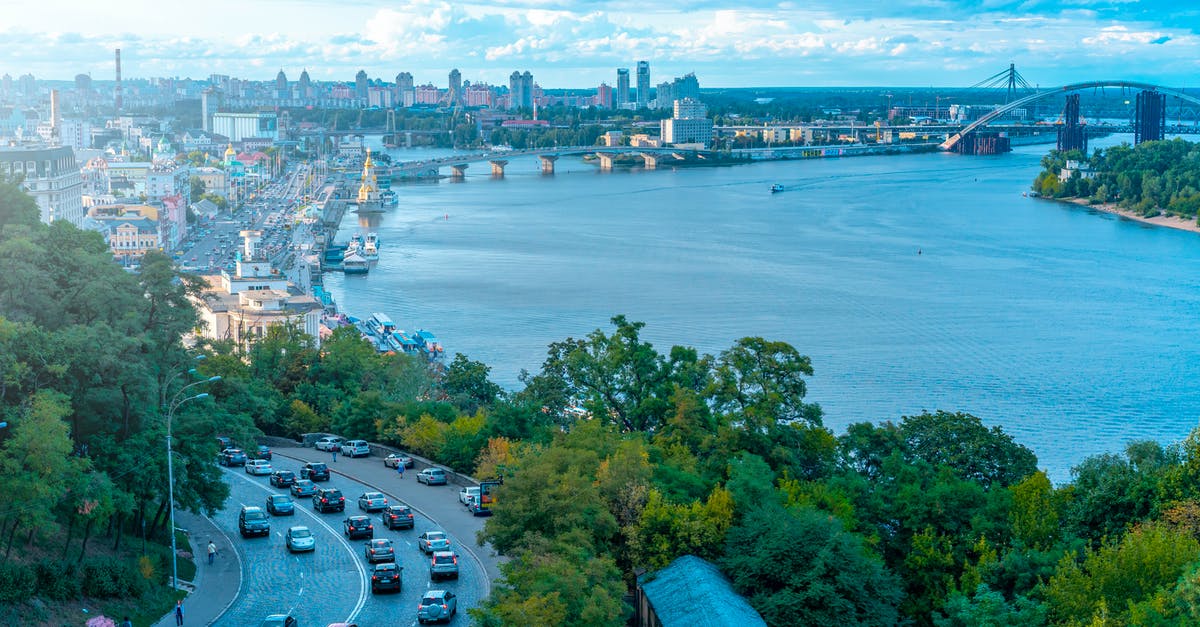 Travelling to Ukraine and Russia, border issues - Vehicles on Road Beside Sea Travelling to Ukraine and Russia, border issues - Vehicles on Road Beside Sea
