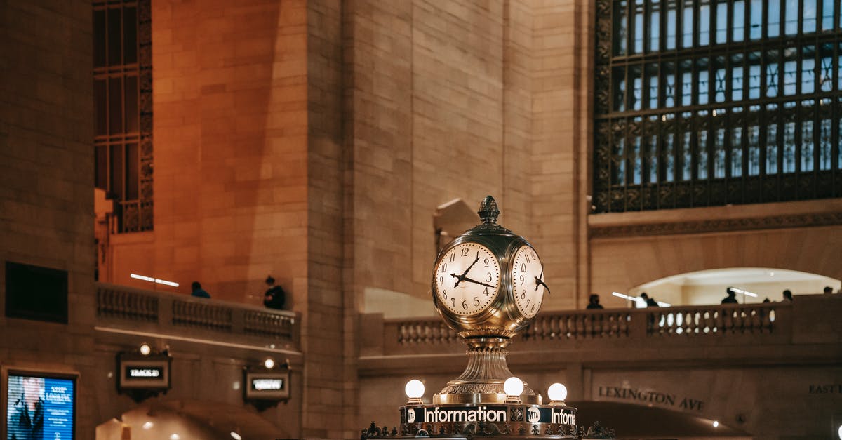 Travelling to USA with a four hour layover between Narita and Haneda - Classic watch on public transport station Travelling to USA with a four hour layover between Narita and Haneda - Classic watch on public transport station