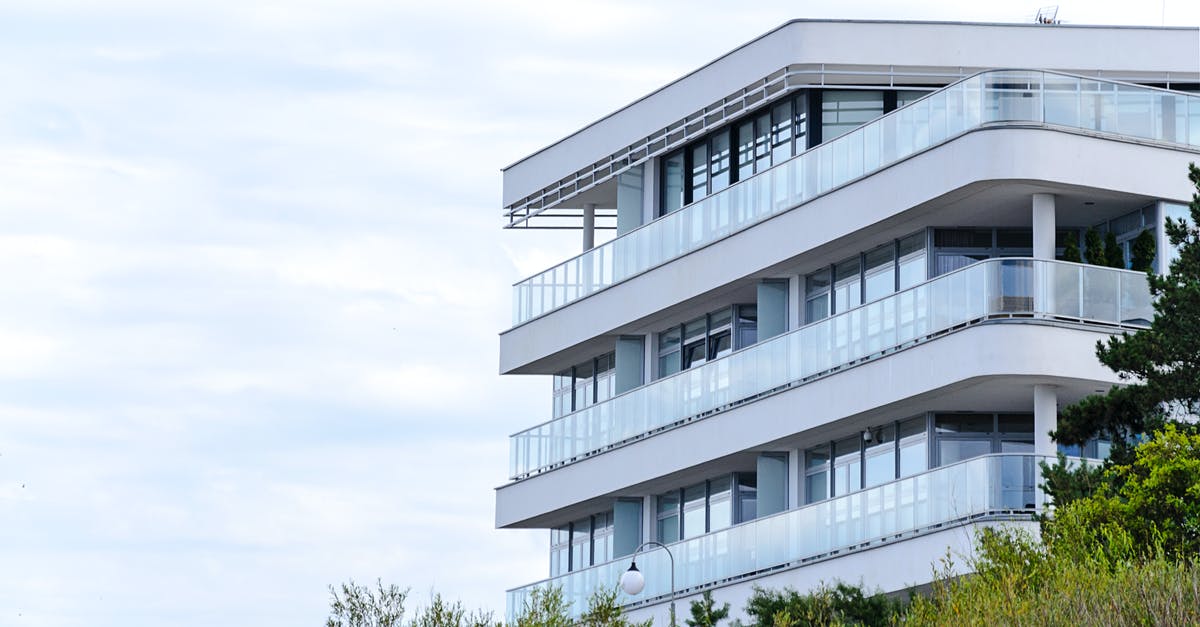 Travelling with the application receipt for a French residence permit? - White and Blue High-rise Building Travelling with the application receipt for a French residence permit? - White and Blue High-rise Building