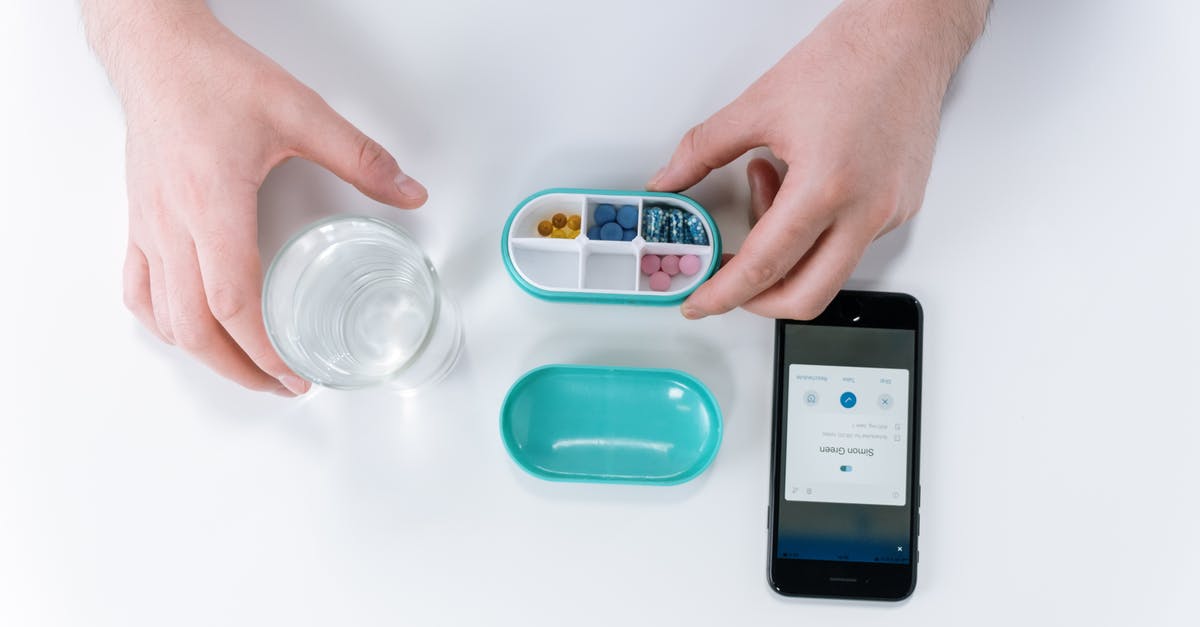 Treatment of Old DS-160 and New DS 160 Submitted Application - Person Holding Pill Box Treatment of Old DS-160 and New DS 160 Submitted Application - Person Holding Pill Box