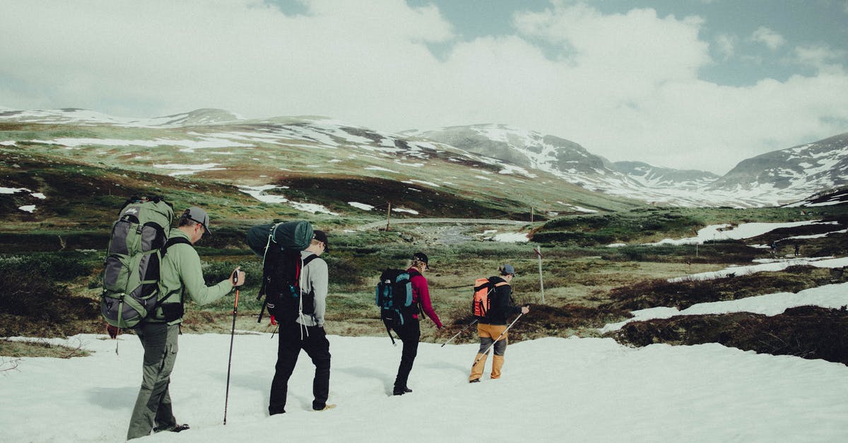 Trekking in Georgian Tusheti region? Safety? - People Hiking on Snow Covered Mountain Trekking in Georgian Tusheti region? Safety? - People Hiking on Snow Covered Mountain