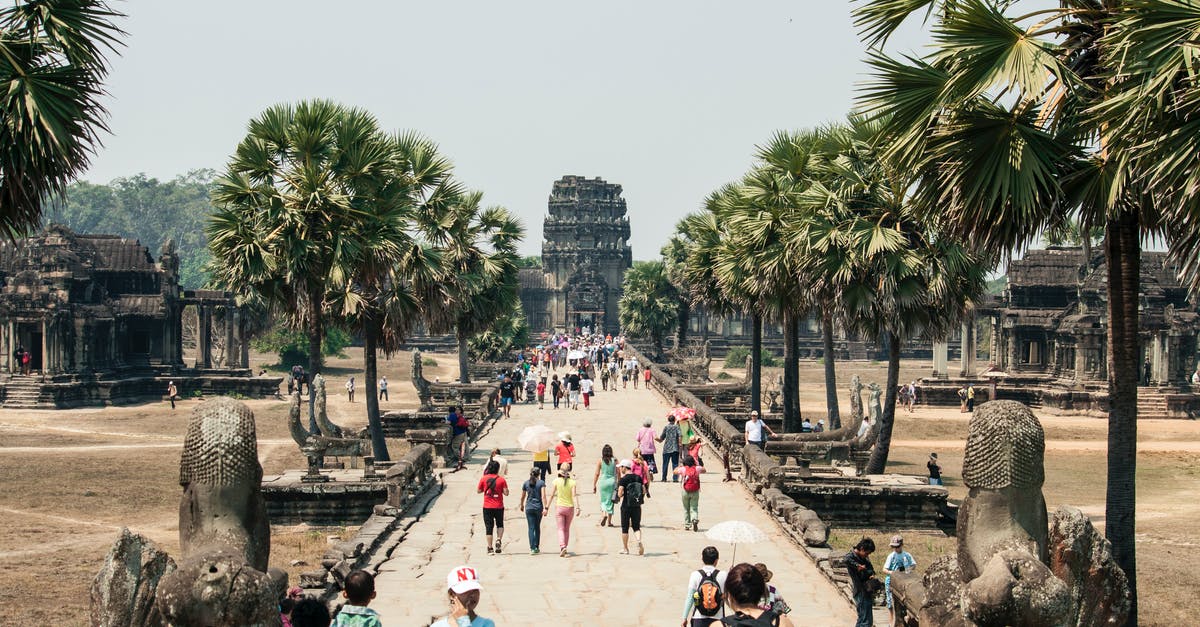 True current procedure and cost of extending Cambodia tourist visa in person? - Crowd of people strolling along paved walkway of ancient Angkor Wat in Cambodia True current procedure and cost of extending Cambodia tourist visa in person? - Crowd of people strolling along paved walkway of ancient Angkor Wat in Cambodia
