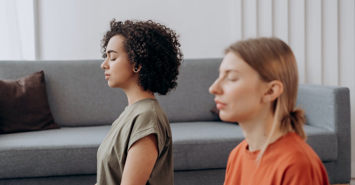 Two adults staying in a room that says "one adult" on the reservation [duplicate] - Two Women In Yoga Position